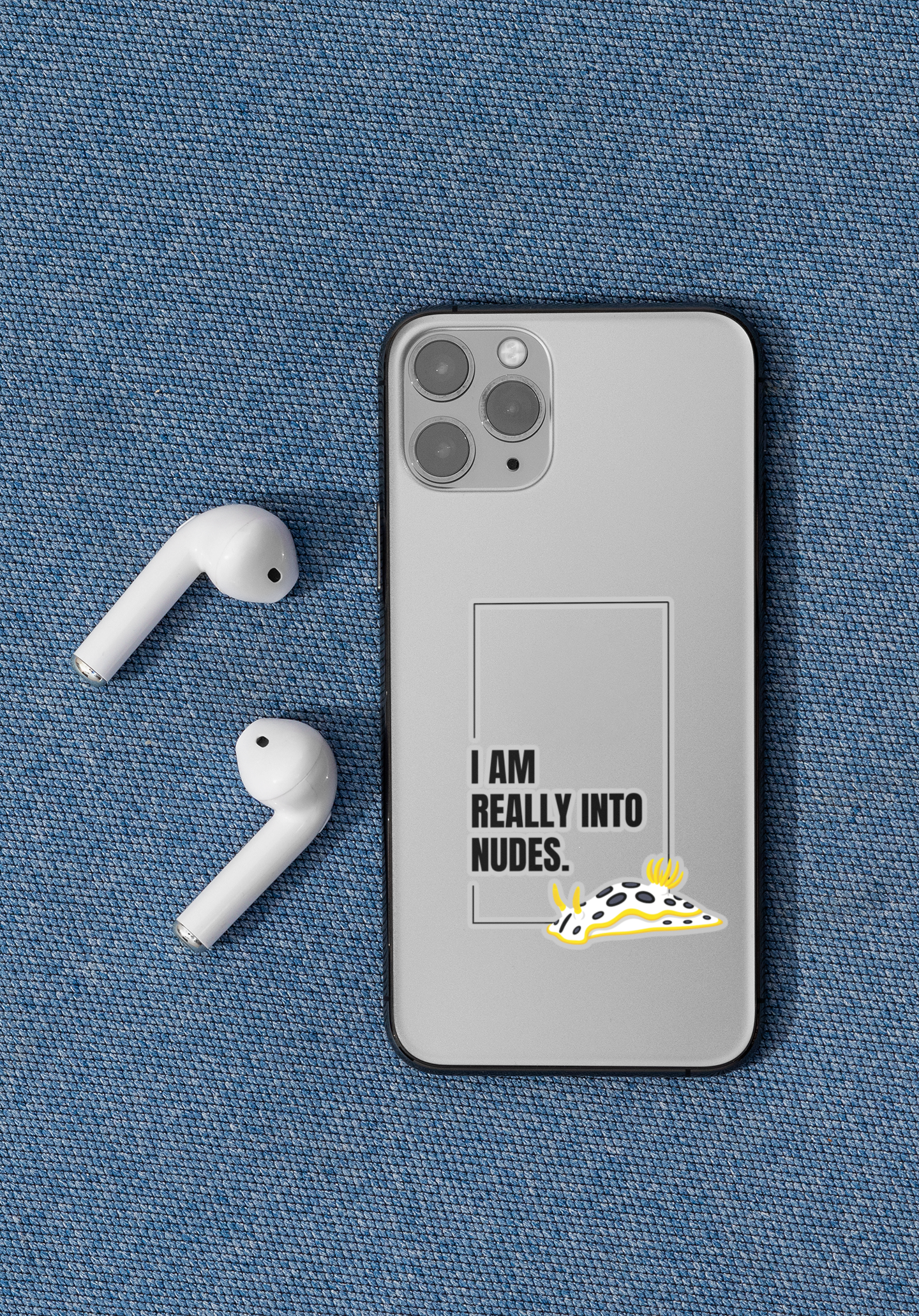 Phone case with humorous text and nudibranch sticker illustration on a blue fabric background
